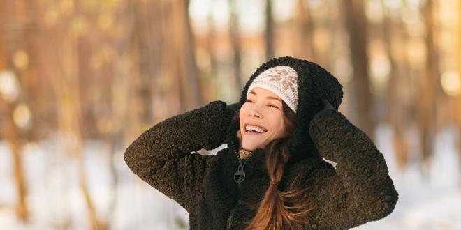 a woman with beautiful skin in the winter air